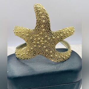Elegant Textured Starfish Wrap Cuff Bracelet. Gold tone. Adjustable